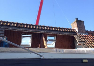 Opbouw en dakkapel prefab op 4 hoog